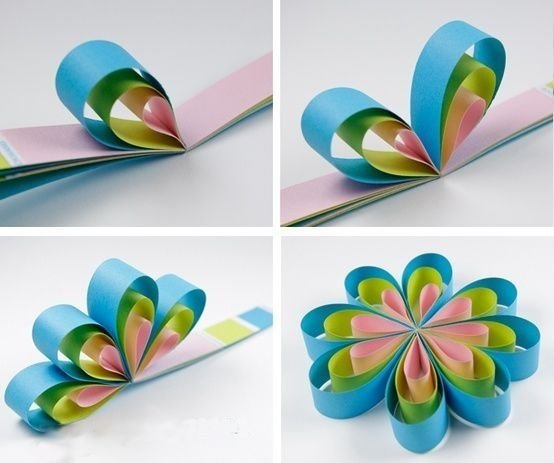 Объемный цветок из полосок цветной бумаги