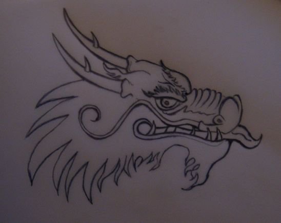 Татуировка голова дракона