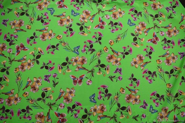 Ткань бабочки на зеленом фоне