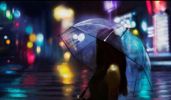 Девушка под дождем в городе