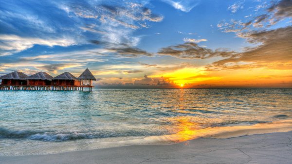 Мальдивы пляж бунгало закат