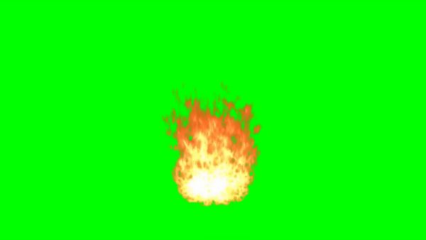 Взрыв огня на зеленом фоне