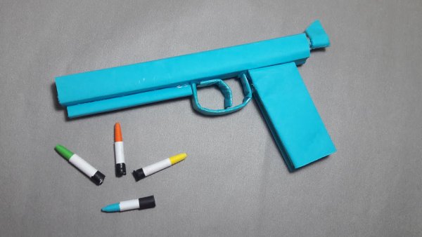 Пистолет стреляющий бумажными пульками