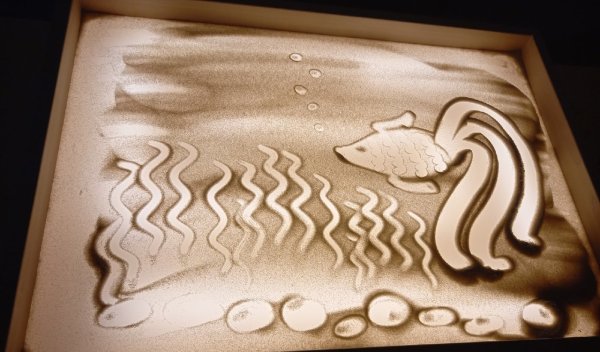 Рисование песком