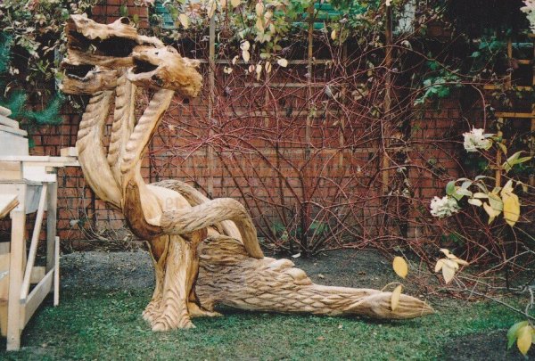 Деревянные скульптуры для сада