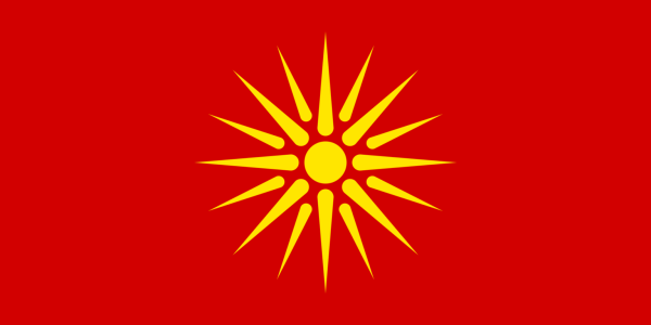 Солнце на красном фоне флаг