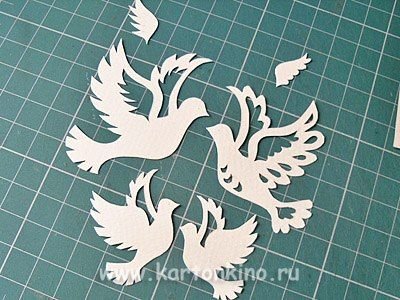 Ажурное вырезание птицы