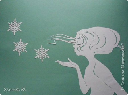 Вытынанки девушка дует на снежинки