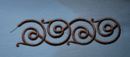 Тесьма с орнаментом вышивки