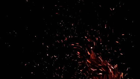 Частицы огня на черном фоне