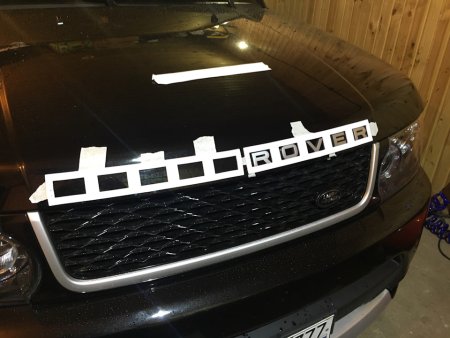 Черные буквы range Rover