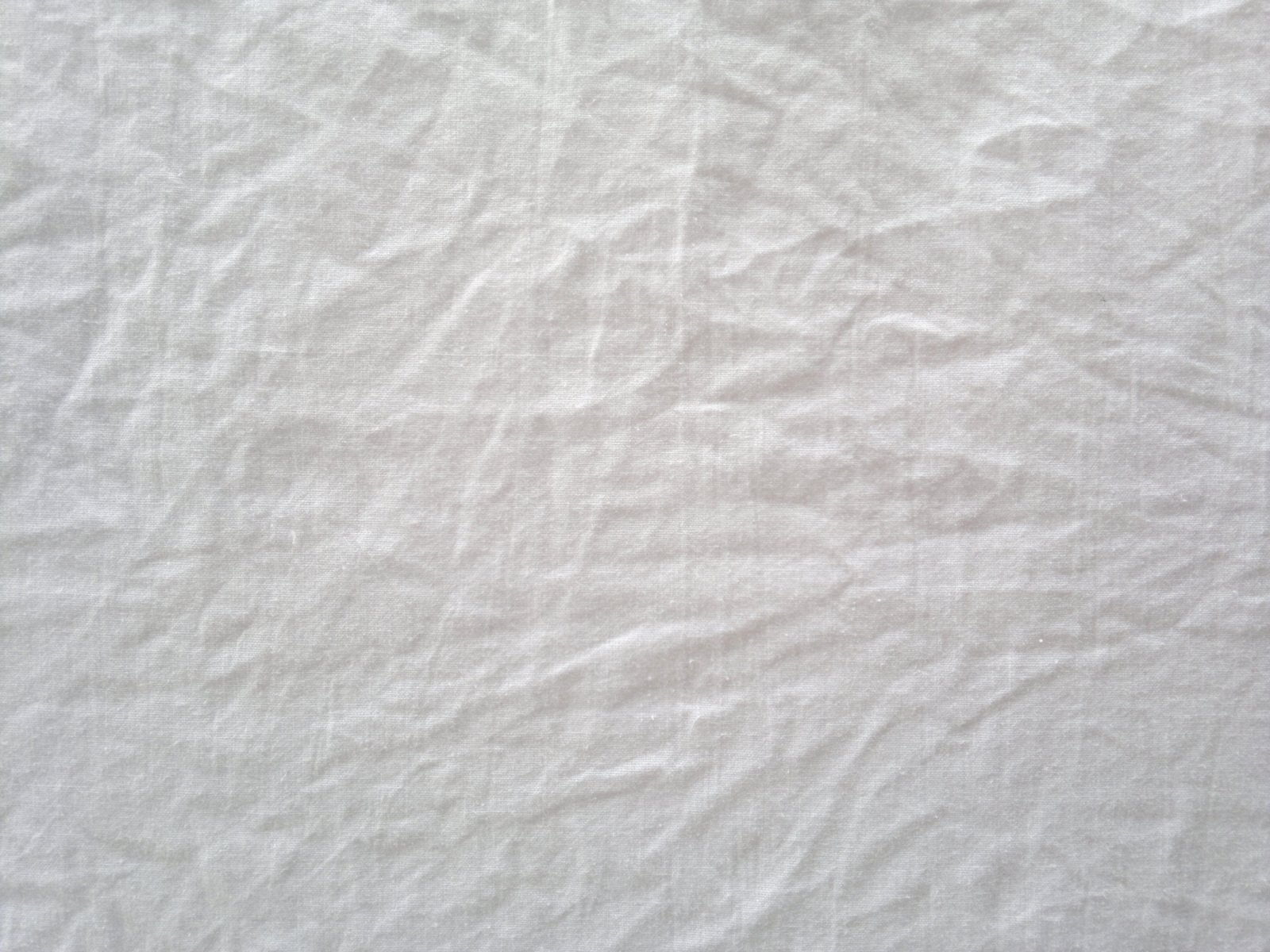 Мятая белая ткань текстура