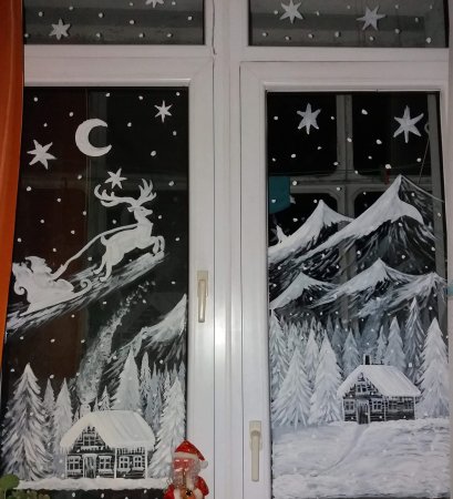 Новогодние рисунки на окнах