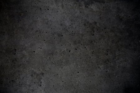 Бетонная тёмно серая стена
