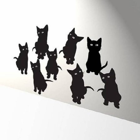 Силуэт кота на стене