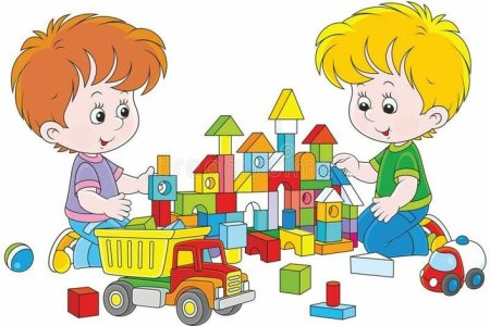 Мальчик играет в кубики