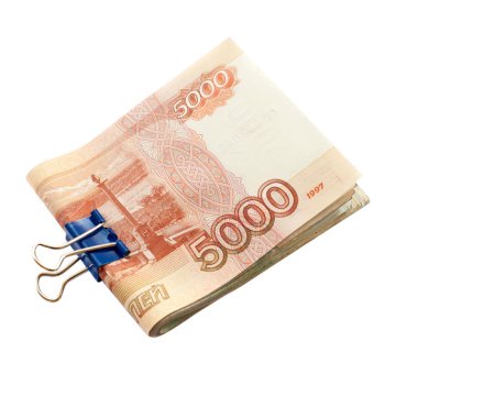 Пачка рублей на белом фоне