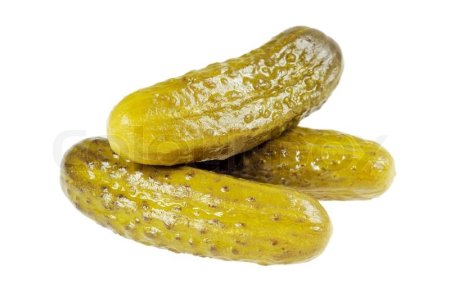 Маринованные огурцы на белом фоне