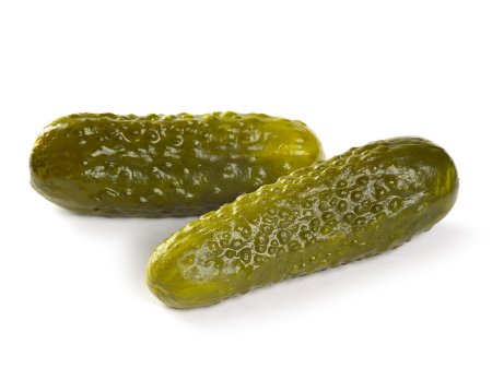 Маринованные огурцы на белом фоне