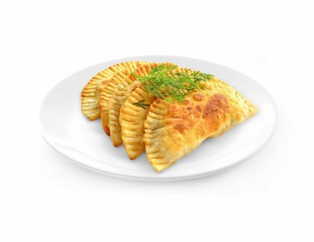 Чебуреки на тарелке