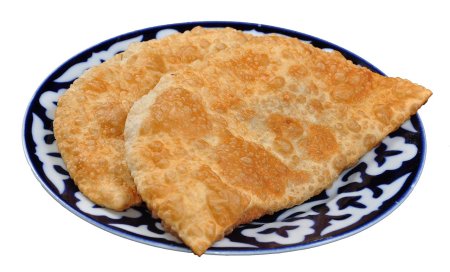 Чебуреки на тарелке